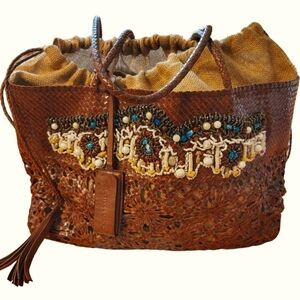 Martina Caponi Braided Leather bag with drawstrings lined beaded on front